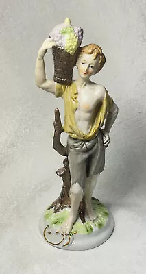 12” Ceramic And Porcelain  Figure Of Boy Carring A Basket Of Grapes • $27