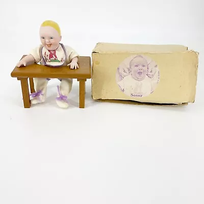 Vintage G.V.W. Inc 1986 Sonny Porcelian Bisque Baby Doll In Wooden High Chair 9  • $15