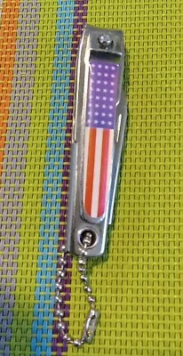 1 Souvenir AMERICAN FLAG NAIL CLIPPER AND FILE W/ KNIFE CAN AND BOTTLE OPENER  • $10