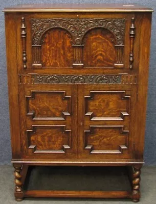 1920s Jacobean Style Oak Drinks Cabinet With Maple Lined Interior • £395