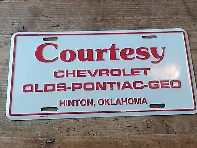 Vintage COURTESY CHEVROLET PONTIAC DEALER LICENSE PLATE. Hinton Oklahoma • $29.99