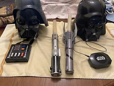 Lot Of 2 Darth Vader Helmets With Lightsabers  • $35