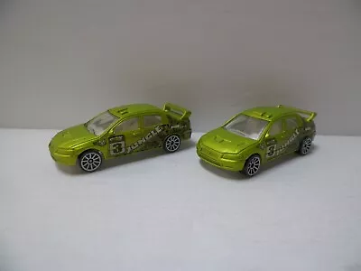 Hot Wheels- Mitsubishi Evo Lot Of 2- Jungle 5 Pack Exclusives--    11 • $11.99