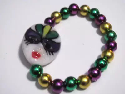 Purple Green And Gold With Plastic Mardi Gras Face Stretch Bracelet • $3.99