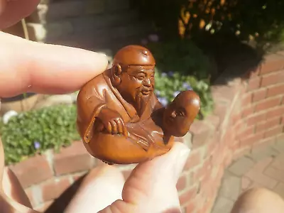 2b.. Hand Carved Wood Netsuke Japanese Man Sits To Sell Mask Collectable Figure • £24.99