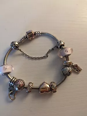 Pandora Bracelet With Charms • £26