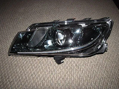 NEW OE SAAB 9-5 Left Driver Side Xenon Headlight Assembly 12842561  2010 2011 • $295