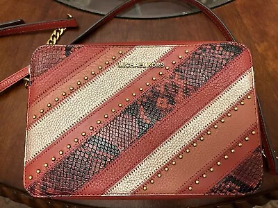 Michael Kors Crossbody Purse . Maroon Snakeskin Striped Pattern • $35