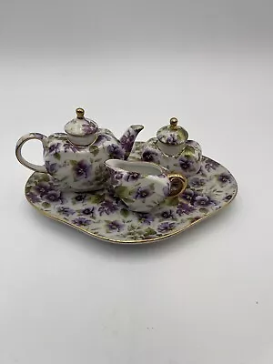 Vintage Miniature Porcelain 6 Piece Tea Set Purple Pansy Decoration • $15