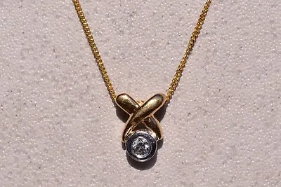 X And O Diamond Pendant In White And Yellow Gold • $420