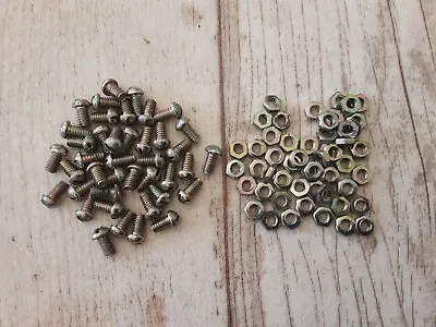 Meccano #37 X 50 Org Iridescent Nuts & Bolts Round Slot Head Hex Nut 1979 • £4.99