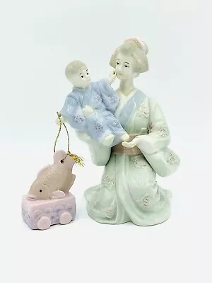 Vintage Japanese Geisha Figurine Holding Child With Koi Carp Toy Pastels 16cm • $24