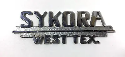 Vintage SYKORA West Texas Car Dealer Dealership Metal Emblem • $16.99