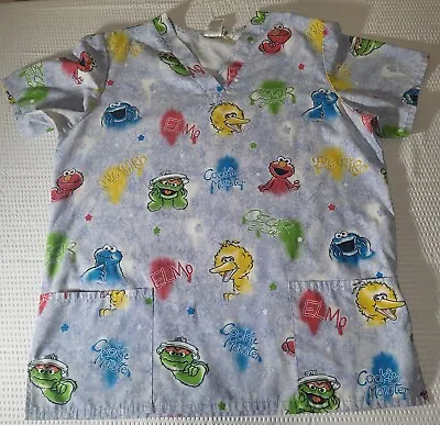 Sesame Street Woman’s Scrub Top Size L Big Bird Elmo Cookie Monster Oscar • $10.97