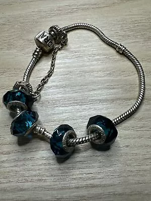 Pandora Bracelet With Four Charms • £4