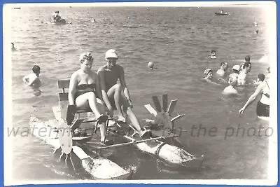 A Guy And A Girl In Swimsuits On A Pedal Boat On The Beach Vintage Photo • $5