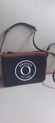 $199 • Buy Black Oroton Saffiano Leather Cross Body Bags $366
