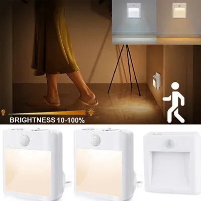 Plug In LED Motion Sensor Night Lights Dimmable Dusk To Dawn Cabinet Stair Lamps • £6.89