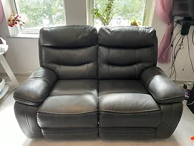 Grey Leather 2 & 3 Seater’s Recliners • £1400