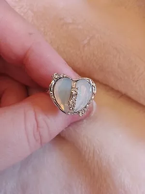 Beautiful Silver Coloured Metal Ring With Two Halves Of A Heart Of Plastic... • £10