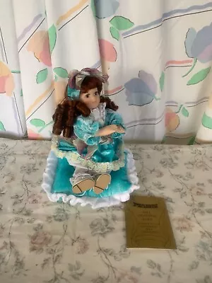 Seymour Mann Music Box Sitting Porcelain Doll - Blue Dress Brown Hair • $30