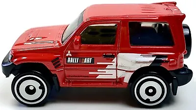 Hot Wheels Mud Studs Mitsubishi Pajero Evolution Red 1:64 LOOSE • $7.69