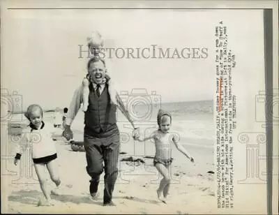 1965 Press Photo Actor Mickey Rooney Plays With His Children In Malibu Beach • $15.99