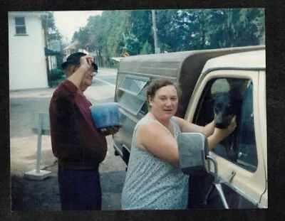 Vintage Photograph Man W/ Woman Standing By Truck Holding Puppy Dog • $7