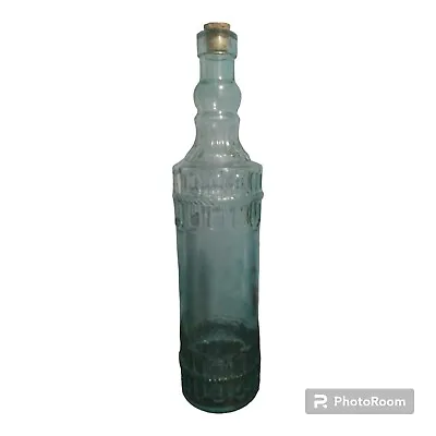 Tall Glass Bottle In Light Blue W/Raised Design On Front & Back W/Cork 12.5  • $12