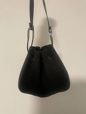 Vintage Gucci Black GG Monogram Canvas Black Leather Drawstring Bag • $270