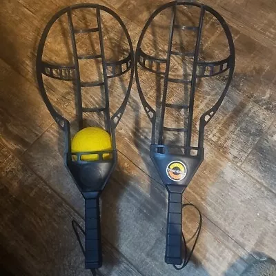 Vintage Wham-O Trac-Ball Toy Game 1975 2-Racquets & 1 Yellow Ball  • $25