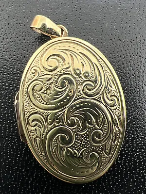 9ct Oval Engraved Locket Pendant. 375. • £165