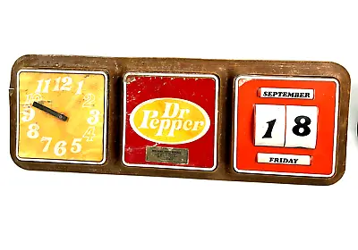 Vintage Dr. Pepper Wall Clock Plastic Woodgrain Calendar Gas Station  28  X 10  • $36.47