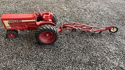 Vintage Ertl McCormick Farmall 806 Tractor With Plow • $80