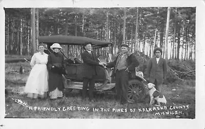 NW Kalkaska MI RPPC TORCH REGION NATIVE AMERICAN DRIVER & GUIDE PRETTY GIRL TOO! • $84.99