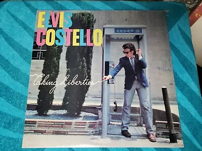 Elvis Costello -  Taking Liberties LP Album Vinyl OIS EXCELLENT All Around • $14.95