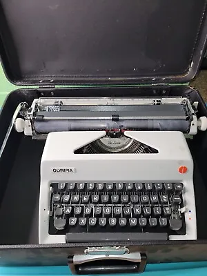 1976 Olympia De Luxe Traveler Typewriter With Instructions Accessories And Case • £163.84