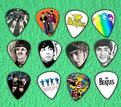 THE BEATLES Guitar Picks Set Of 12  • $7.96