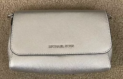 Michael Kors Silver Clutch NWOT  9 X 6 X 1.5 With Strap For Shoulder Bag !!!! • $32