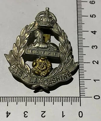 A WW1 / WW2 British Army EAST LANCASHIRE FUSILIERS REGIMENT Brass / Wm Cap Badge • £13