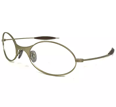 Vintage Oakley Eyeglasses Frames E Wire First Generation Matte Gold 55-22-135 • $79.99