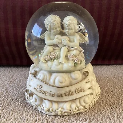 Love Is In The Air Cherub Angel Snow Globe La Vie En Rose Ceramic Music Box  • £33.78