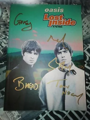 Oasis Signed Book • £200