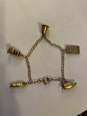 Vtg 14K Gold Charm Bracelet 7” W/5 14k Charms Boat Pagoda Abacus Bell Fish 8.2g • $499
