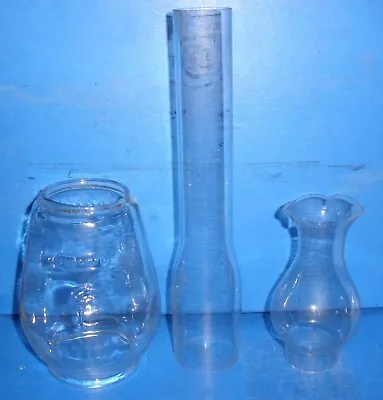 A Trio Of Vintage Glass Chimneys For Oil Lamps. • £14