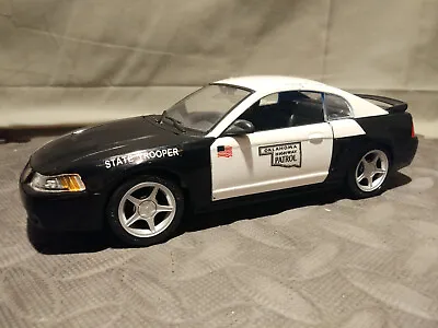 1/24 Maisto Oklahoma Highway Patrol 1999 Ford Mustang Cobra Black/white • $20