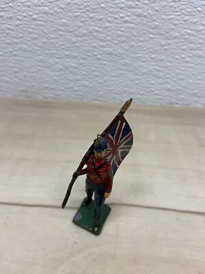 Vintage Metal Britains Soldier With Flag Made In England • $14.87