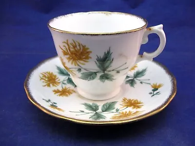 Vintage Royal Malvern Tea Cup &  Saucer - Gilded Edges Yellow Flowers - England • $21