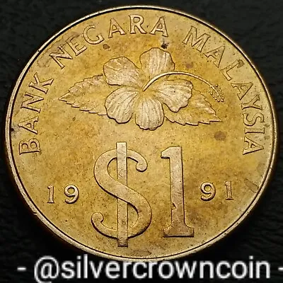 Malaysia 1 Ringgit 1991. KM#54. One Dollar Coin. Flower. Malaya. Dagger.  • $10.90