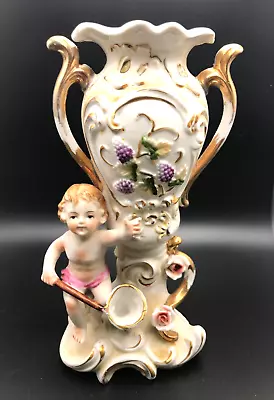 $15 • Buy ANTIQUE CHERUB VASE With CHERUB HOLDING A NET MARK IMPRESSED 'N' In CIRCLE